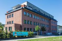 Komerční stavba s cihlovou fasádou Olm-Orme